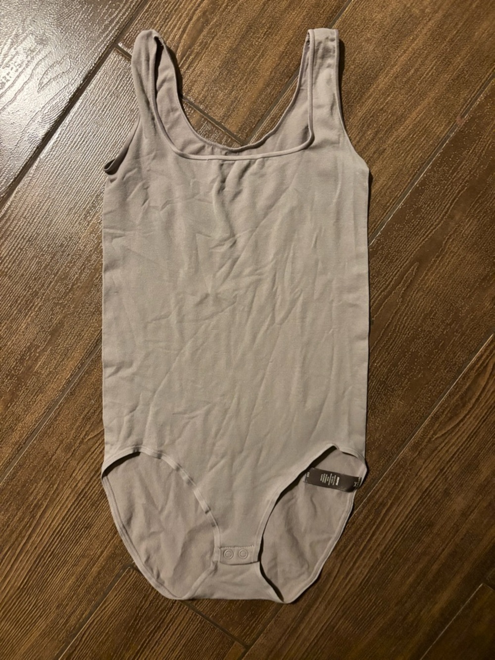 SKIMS Sleeveless Scoop-Neck Bodysuit in Taupe